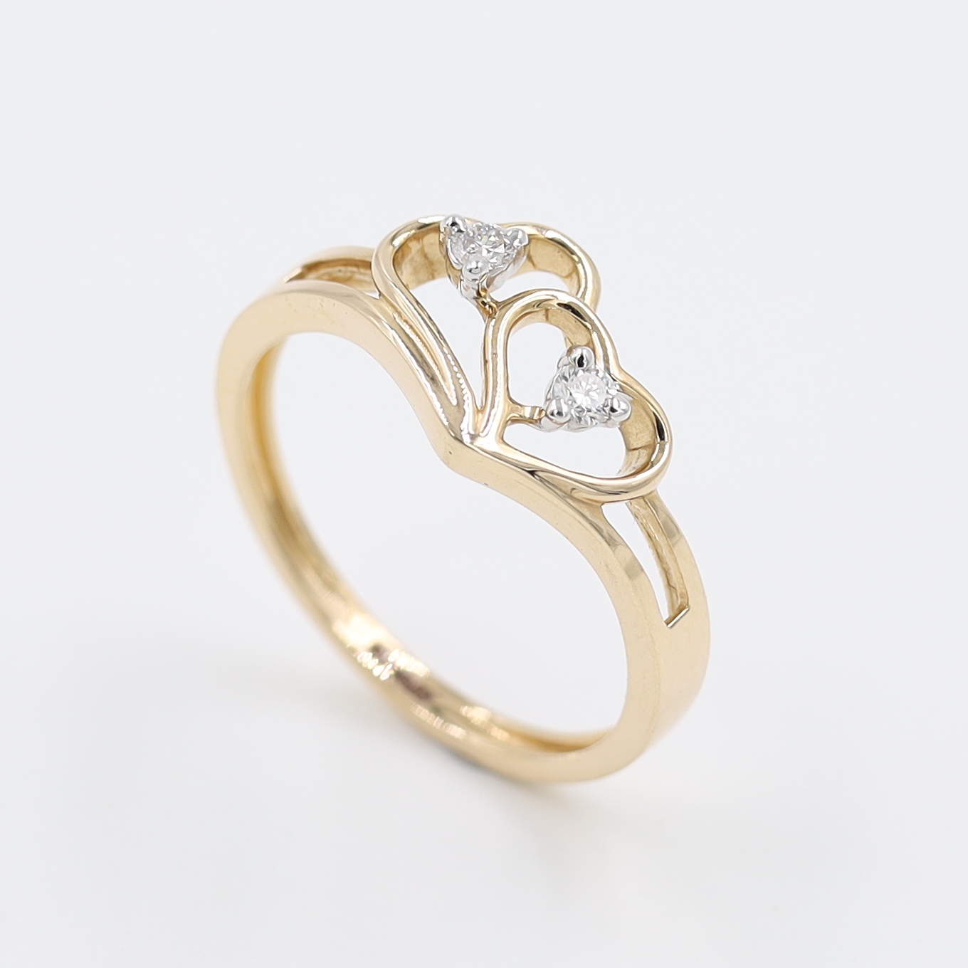 14Kt Rose Gold Ring In Shape Of Hearts With Two Diamond on It