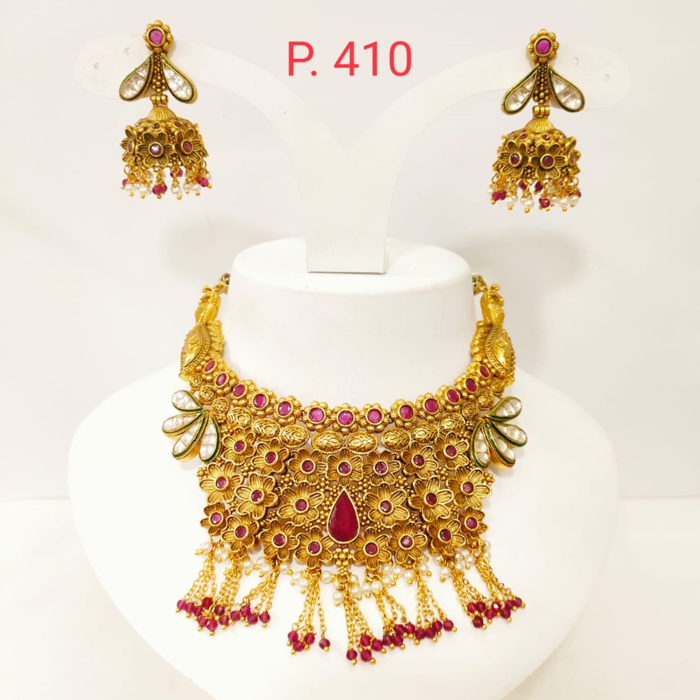 Full antique with hanging string and gold plated middle ruby stone 1398