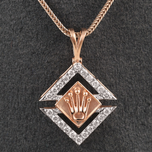 18kt rolex shaped diamond pendant 