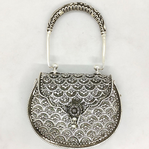 Real silver hand bag in fine carvings and stu