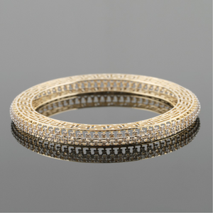 18kt yellow gold designer diamond bangle 