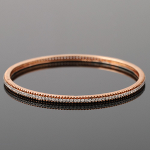 18KT Gold Unique Diamond Bangle
