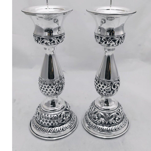 Pure silver candle stands in fine antique nak