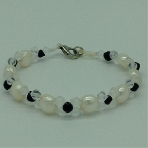 White button pearls and white, black cystals