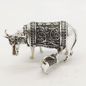 Pure silver cow & calf in antique carving