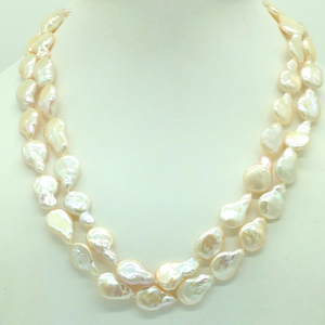 Freshwater cream drop baroque pearls long k