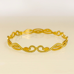 18k stamped yellow gold curvy dainty slip-on 