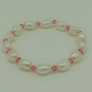White oval baroque pearls with pink crystals