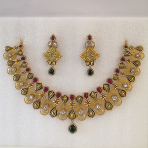 22k gold And diamond red and green color ston