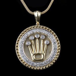 18kt rolex shaped diamond pendant 