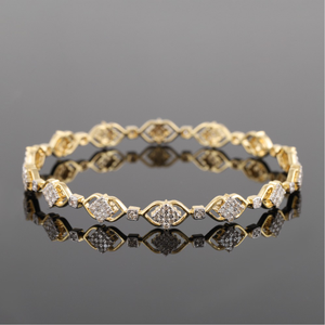 18kt yellow gold designer diamond bangle 