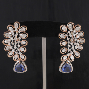 18kt rose gold blue stone diamond round shape