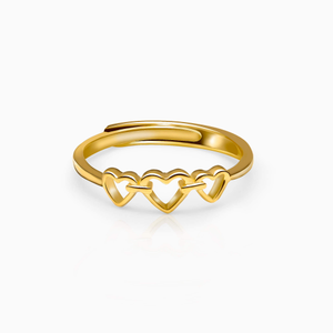 Golden triple heart ring