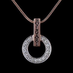 18kt bvlgari shaped diamond pendant 