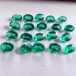 13.95ct oval green emerald-panna