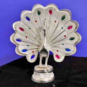 silver plated peacock idol