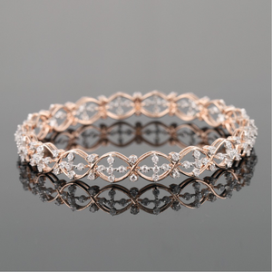 18kt rose gold designer diamond bangle 