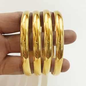 18 kt yellow gold plain handmade slip-on brac