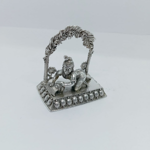 Pure silver idol of Ladoo Gopal in antique po