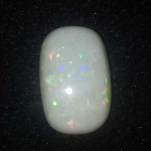 4.94ct oval multicolored opal