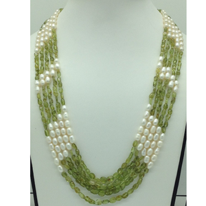 white oval pearls with peridot 5 layers ne