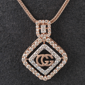 18kt gucci shaped diamond pendant 