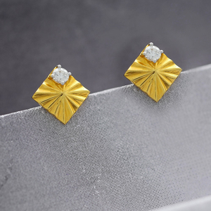 Spectacular gold stud earrings