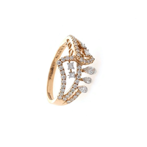 Fancy ring with round and pear diamond in 18k