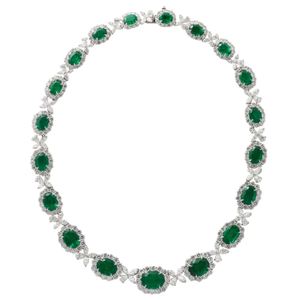 52.93 carats of VIVID GREEN fine emeralds.  4