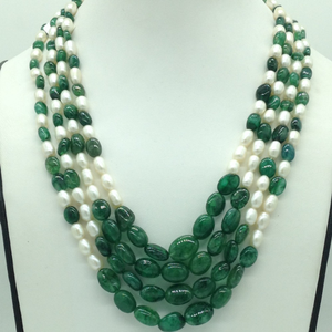 White oval pearls with green bariels 4 lay