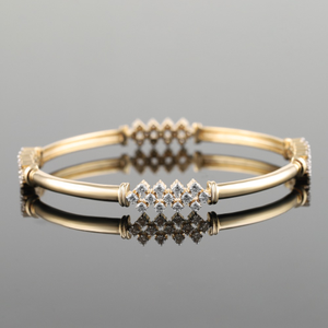 18kt yellow gold designer diamond bangle 