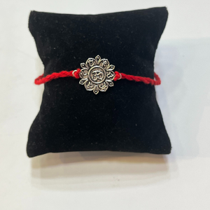 925 silver om design rakhi