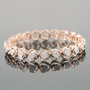 18kt rose gold designer diamond bangle 