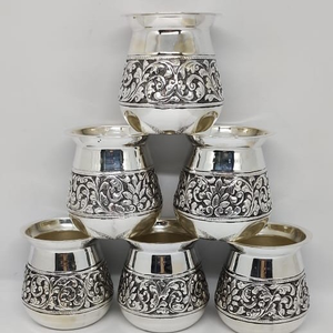 Pure silver kesar milk glasses in antique car