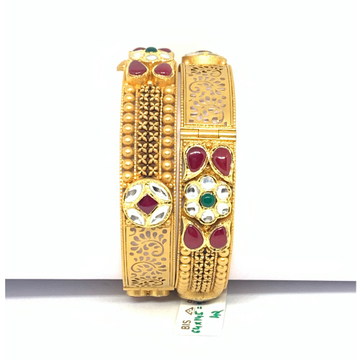 Designer gold antique bangles by Rajasthan Jewellers Private Limited