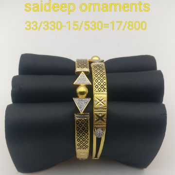 916 22 kt bangle Kadli design by Saideep Jewels