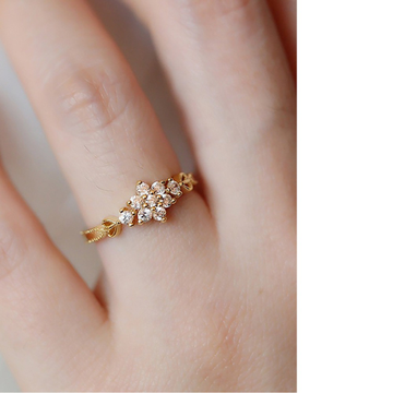 18kt floral ring by 