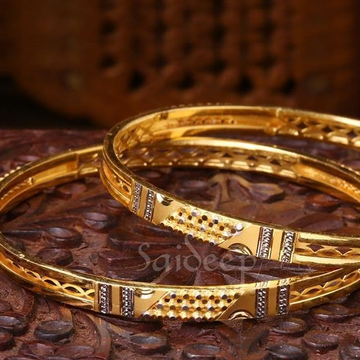 Gold divine bangles by Saideep Jewels