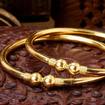 Gold fancy bangles by Saideep Jewels