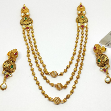 Designer gold set by Rajasthan Jewellers Private Limited