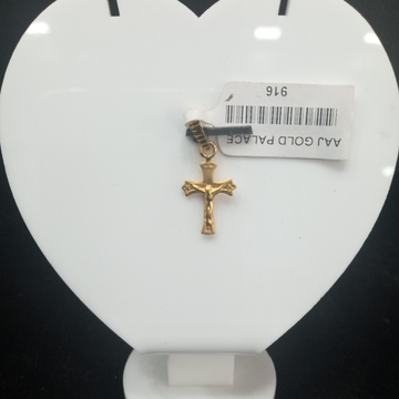 cross pendant by Aaj Gold Palace