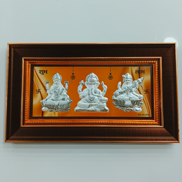 Laxmi ganesh sarasvati tri murti frame by Ghunghru Jewellers