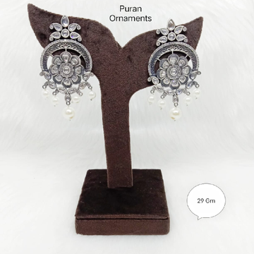 Pure silver designer hanging earring studded with...