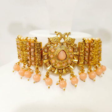 full choker with peacock style design with pink ha...