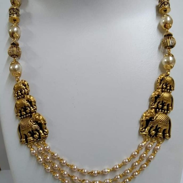 Gold pearl necklace by Vipul R Soni
