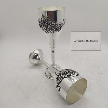 Puran hallmark silver wine glasses with fine carvi...
