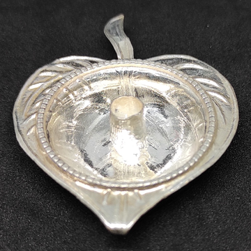 silver oil lamp by 