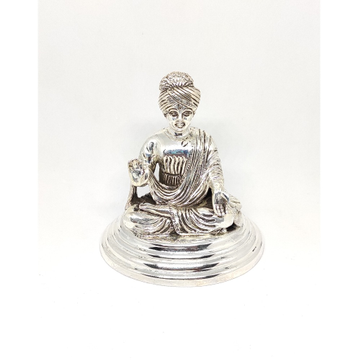 Antique silver God Swaminarayan by Rajasthan Jewellers Private Limited