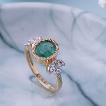 18kt emerald ring by 