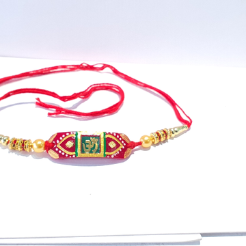 Gold Om Rakhi by 